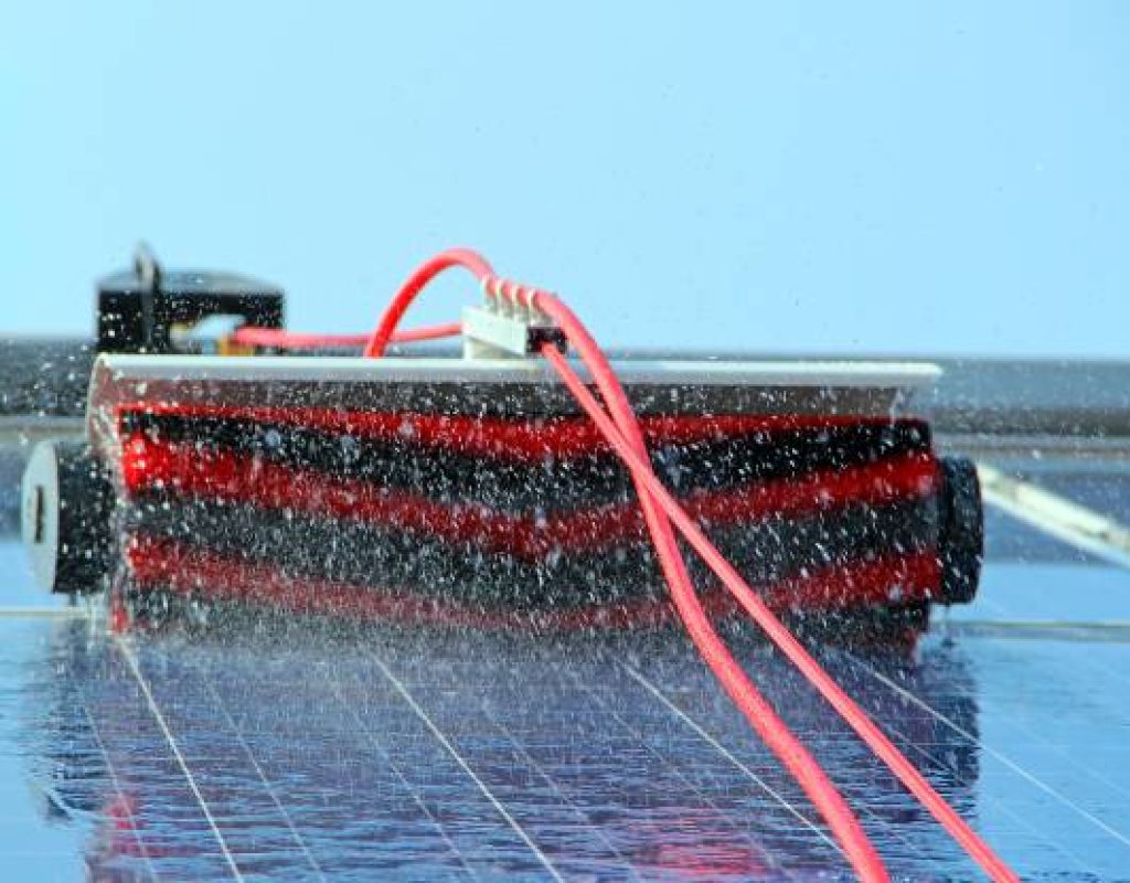 Technician cleaning solar panels in Harmony Grove, CA