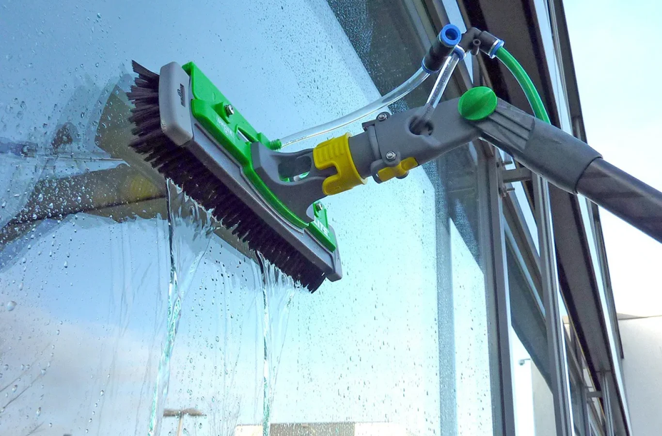 Professional window cleaning service in Clarksville, TN, removing dirt and streaks from a home’s windows.